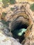 Cave of Baratas near the cliffs of Praia Joao de Arens beach