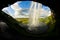 Cave behind Seljalandsfoss waterfall,river Seljalandsa,Iceland