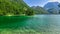 Cave Del Predil - Scenery of Lake Predil with panoramic view of majestic mountain peak Cinque Punte