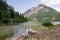 Cave Del Predil - Scenery of Lake Predil with panoramic view of majestic mountain peak Cinque Punte