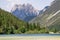 Cave Del Predil - Scenery of Lake Predil with panoramic view of majestic mountain peak Cinque Punte