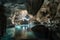 cave with delicate spelunking formations and crystal clear water