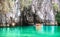 Cave entrance of Puerto Princesa subterranean underground river with longtail boat - Wanderlust travel concept at Palawan