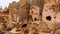 Cave houses and monasteries carved into tufa rocks at Zelve Valley in Cappadocia, Turkey