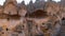 Cave houses and monasteries carved into tufa rocks at Zelve Valley in Cappadocia, Turkey