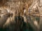 Cave with lake, stalactites and stalagmites