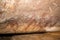 Cave paintings on the wall, painted ocher rock. prehistoric man, the primitive Neanderthal. the leader of the tribe, the shaman, p