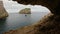 Cave on Rocky Coast with Cliffs on the Mediterranean Sea. Sardinia, Italy. Background.