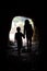 Cave silhouette of children