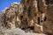 Cave tombs in Nabataean city of the Siq al-Barid in Jordan. It i