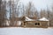 Caved roof on log cabin