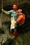 Caver abseiling in a pothole.