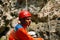 Caver abseiling in a pothole.