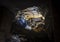 A caver explores a cave with a lantern. Odessa Catacombs, Ukraine