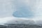 Cavern in blue glacial iceberg, Antarctica