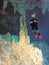 A Cavern Diver Hovers Near an Underwater Cave Column