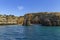 Caves and arches in the rock formations along the coastline, Algarve, Portugal.