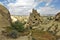 Caves have been cut in the amazing pointed rock. Unique landscape of Cappadocia