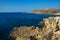 Cavo Greco cape on Cyprus. Travelling and vacation concept. Spectacular rocks on the Mediterranean Sea shoreline. Clean and blue