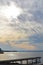 Cayuga Lake rainbow colored clouds at sunset