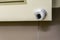 CCTV security camera on ceiling in office zone