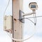 CCTV, Surveillance security camera on exterior electric pole.