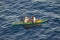 Cebu, Philippines - Circa April 2019: Traditional peaceful philippines fisherman on a wooden boat catching fish on a sunrise close