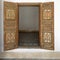 Cedar wood painted open doors in the Bahia Palace in Marrakesh, Morocco.