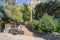 Cefalu, Italy - March 24, 2019: Entrance to Rocca di CefalÃ¹, stairs leading to the pathway to hill top - Cefalu, Sicily