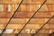 Ceiling background of wooden timbers painted in brown colors