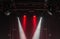 The ceiling of the concert stage with red and white spotlights on the stage farm