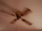 Ceiling fan. Creating air coolness on hot days. Dramatic cinematic atmosphere