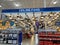 The ceiling fan and lighting aisle at Lowes home improvement store with hanging ceiling fans waiting for customers to purchase