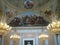 Ceiling frescoes with crystal  hanging chandeliers in Villa Torlonia to Rome in Italy.