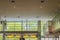 Ceiling and glass walls and and mezzanine in the lobby.