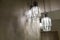 Ceiling light. Modern three-lamp chandelier. Lamp in the bathroom. Reflected in the mirror