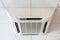 Ceiling mounted large air-conditioner in office, close-up view