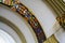 Ceiling of a semicircular form of the Soviet building with curved and multi-colored stained-glass windows. Old architecture.