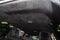 The ceiling of the SUV car pulled by black soft material alkantara in the workshop for tuning and styling the interiorof the