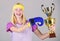 Celebrate victory. Boxing champion. Athletic girl boxing glove and golden goblet. Woman wear sport outfit. Girl cheerful