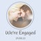 Celebrating love, a couple\\\'s intimate moment captures the joy of engagement