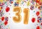 Celebration 31 birthday Happy birthday, congratulations poster. Balloons numbers with sparkling confetti. Vector