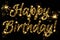 Celebration concept. Text Happy Birthday written sparkling sparklers isolated on black background. Overlay template for greeting