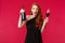 Celebration, holidays and women concept. Portrait of pumped and excited stylish pretty redhead woman suggesting have a