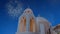 Celebratory fireworks for new year over orthodox white church in santorini, Greece