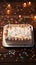 Celebratory top view birthday cake with confetti on wooden background