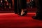 Celebrities on red carpet, women's shoes close-up. Generative AI