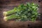 Celery root. Fresh celery root with leaf on rustic oak table