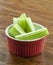 Celery Stalks in a Red and White Bowl