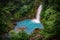 Celestial blue waterfall in volcan tenorio national park costa rica